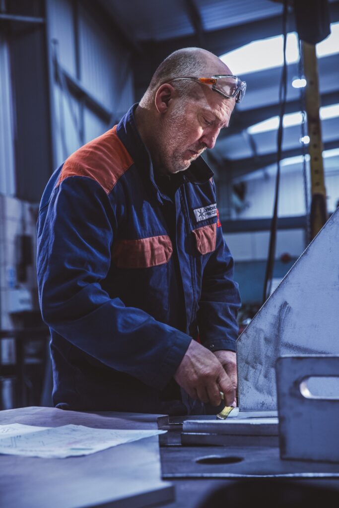 A welder at Lyndhurst Precision